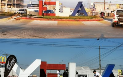 Reparan letra y arriate destruidos en accidente de tránsito