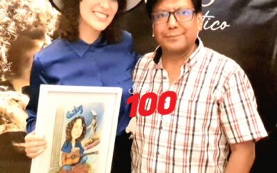 Artista quetzalteco entrega caricatura a la cantautora guatemalteca Gaby Moreno
